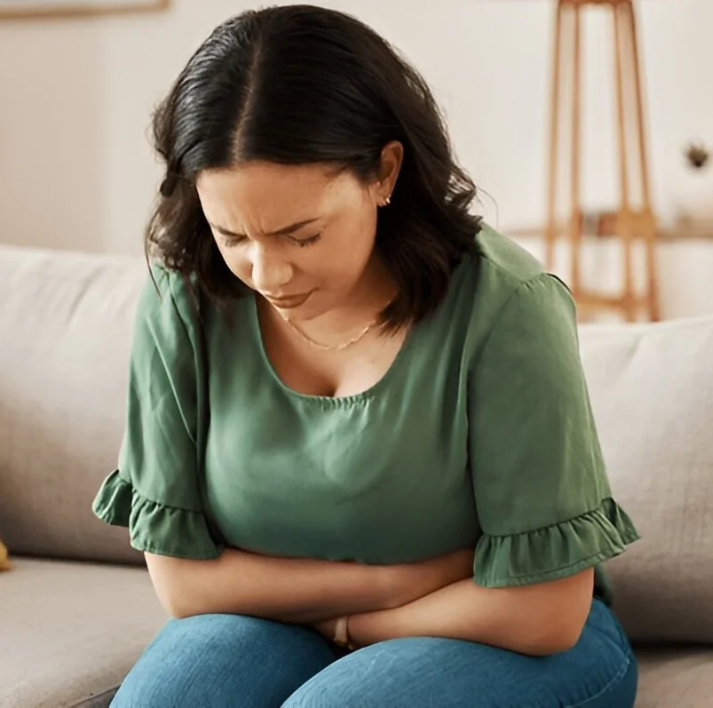lady in pain with digestive problem