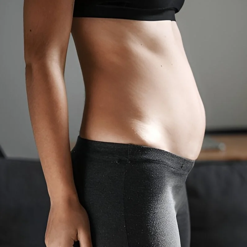 Woman with Bloated Abdomen