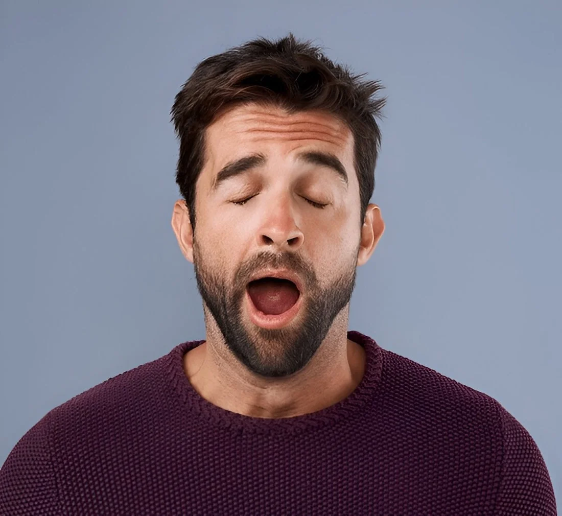 Tired man Yawning