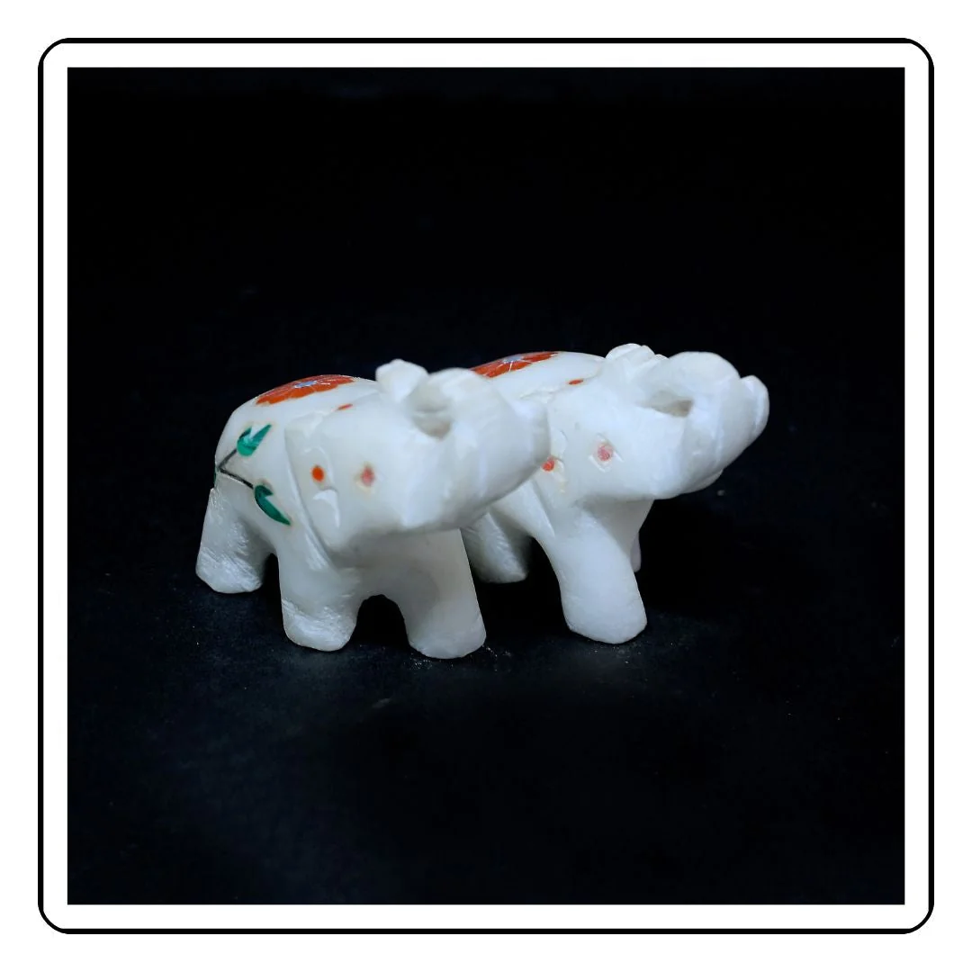 Mini Marble Elephant Decor Set featuring two inlaid marble elephants in traditional Indian style."