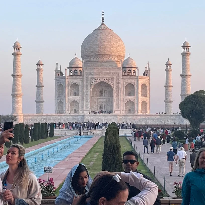 front view of the Taj Mahal with Tourists