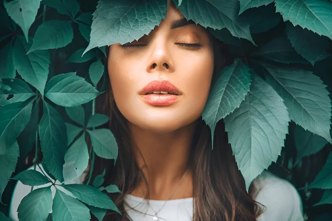 lady with vegetation in tune with nature